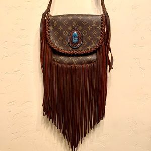 Vintage authentic Louis Vuitton fringe purse
